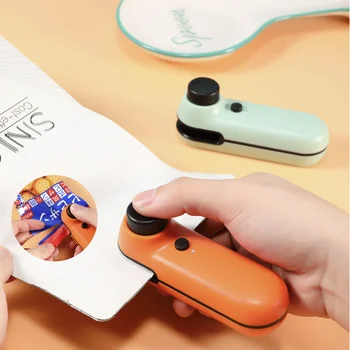 Máquina de selagem de home Pequeno lanche a pressão da mão de mini-portáteis home quente selo de carregamento saco plástico Saco Clipes